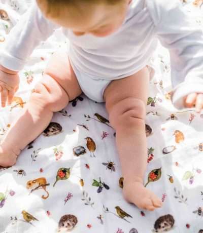baby on hedgerow muslin