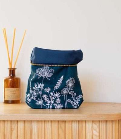 navy tall washbag rolled down